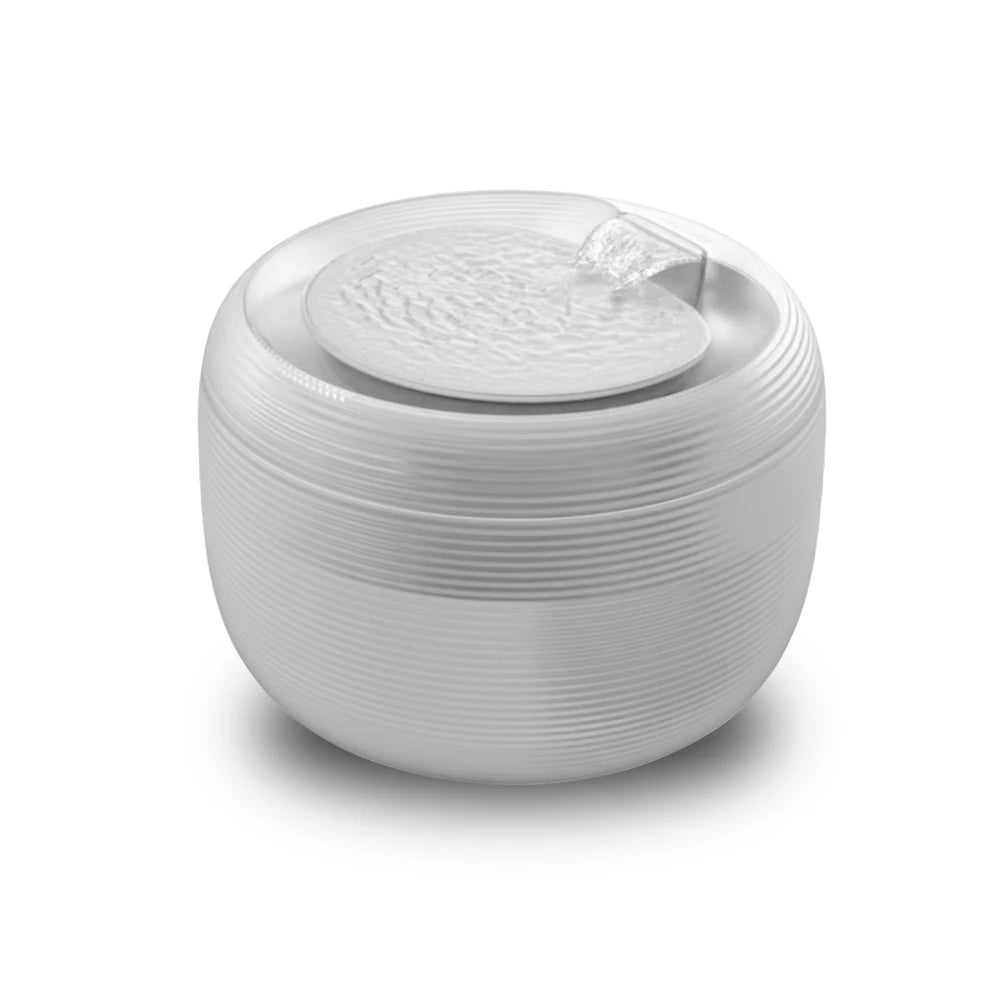 Bol en céramique blanche avec couvercle texturé, parfait pour la décoration et le rangement.