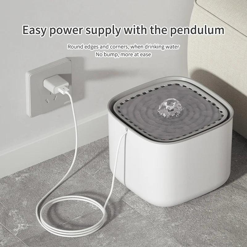 Distributeur d'eau décoratif blanc avec pendule, bord arrondi, design moderne, pratique à utiliser.