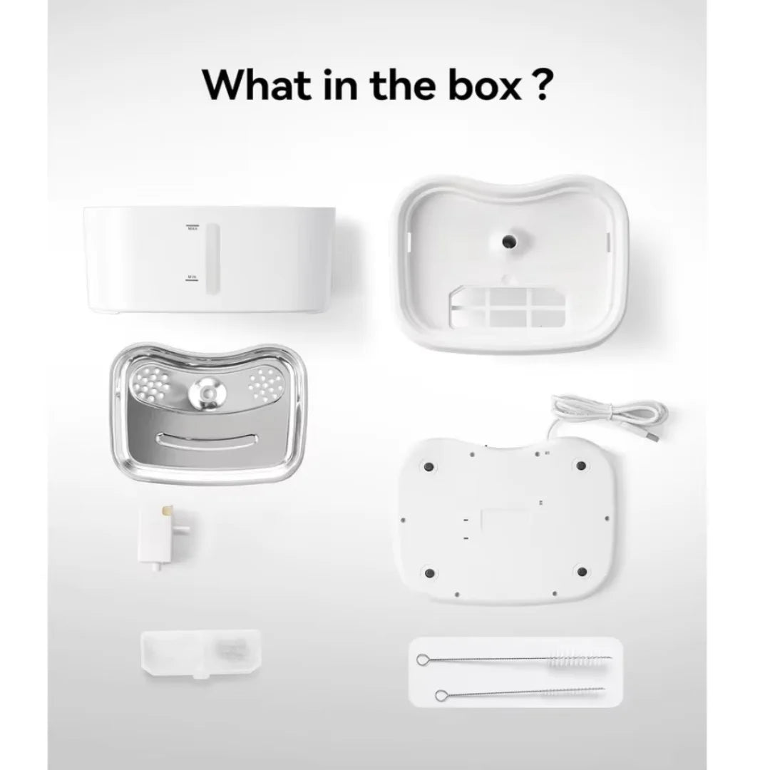 Contenu de la boîte : dispositif blanc, câble USB, nettoyants et accessoires en métal pour un usage quotidien.