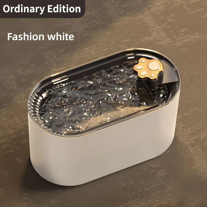 Fontaine à eau pour animaux, édition ordinaire, couleur blanche, design élégant avec pommeau en forme de patte.