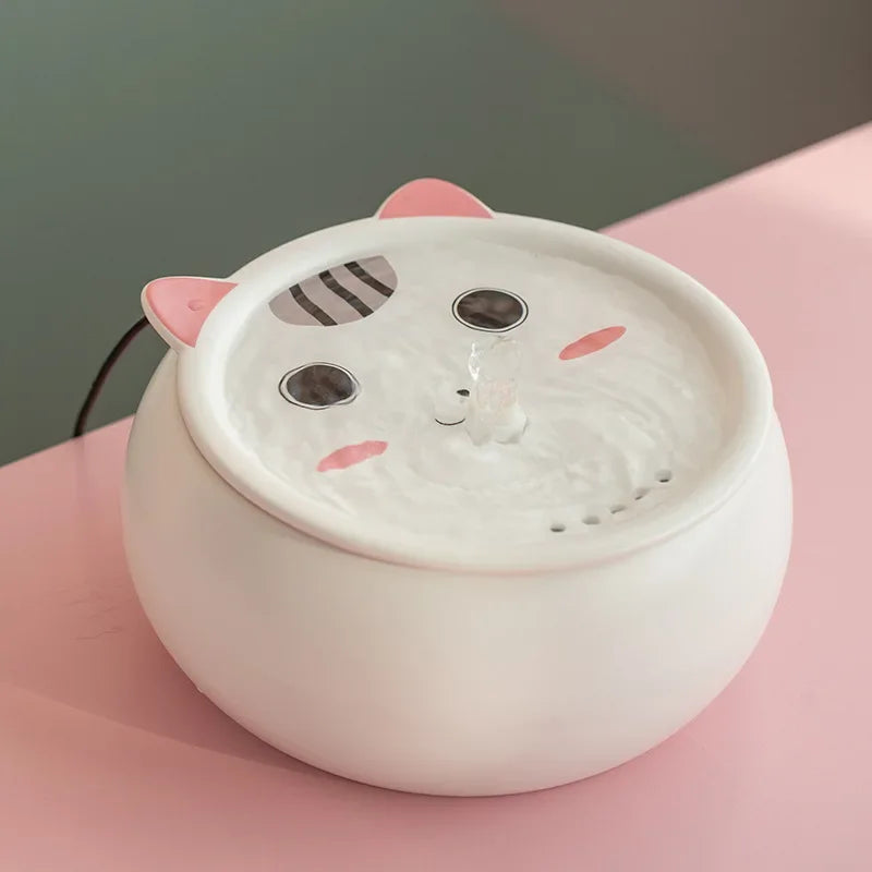 Fontaine à eau pour animaux, en céramique blanche, design mignon de chat, idéale pour les petits animaux.