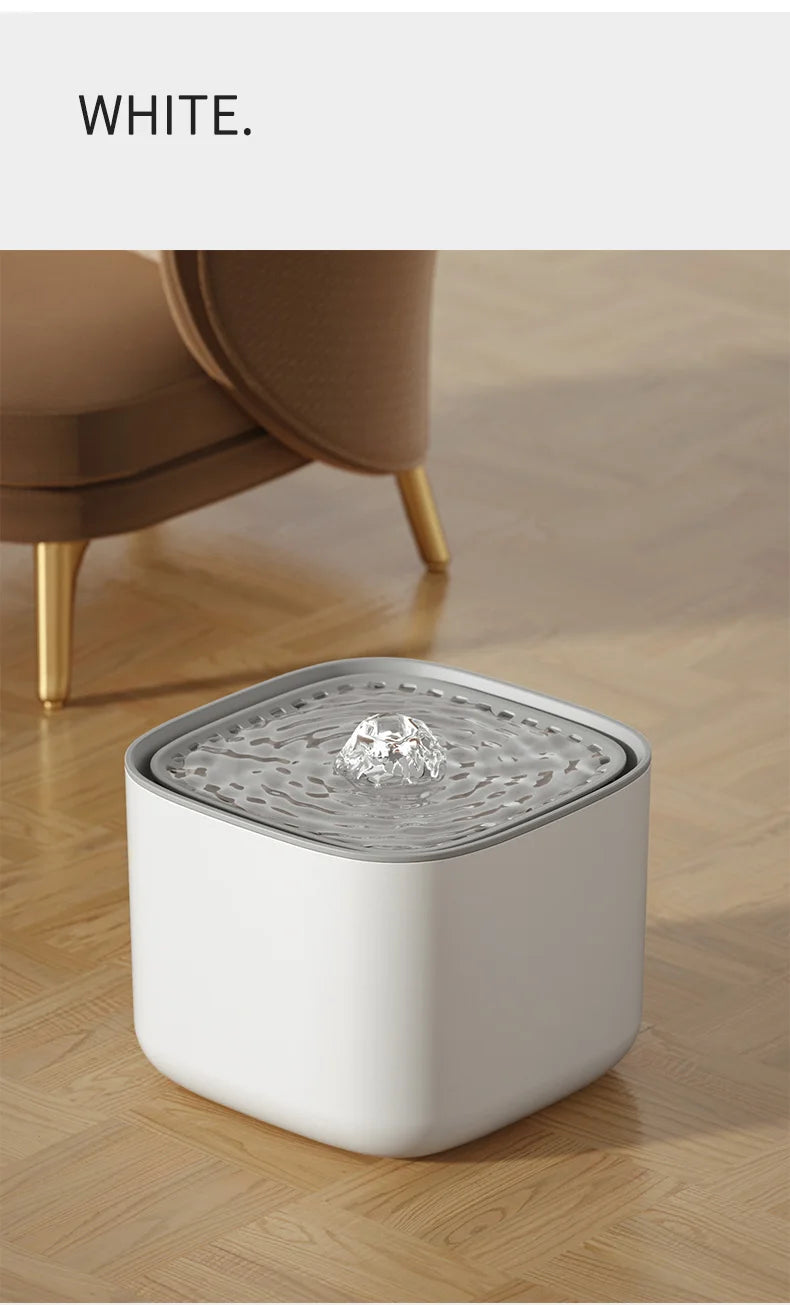 Fontaine décorative carrée blanche en résine avec effet d'eau ondulante.